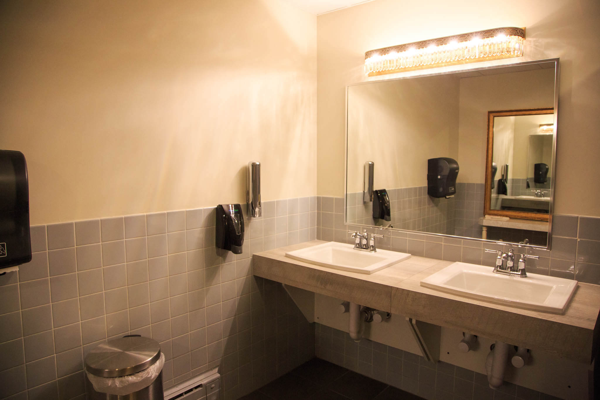 Sinks in the renovated washrooms allow easier access for users in wheelchairs